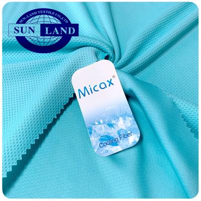 China Anti-static sports cooling towel materia micax jade fiber 100% polyester freshness hexagon honeycomb mesh fabric for sale