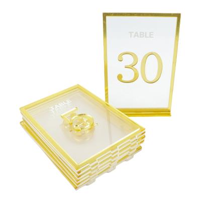 China LOW MOQ Acrylic Acrylic Laser Cut Borders Frames Table Gold Number With Gold Stand Holders For Wedding Centerpieces Table Decoration for sale