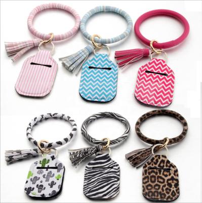 China Gift Travel Empty Leakproof Plastic Bottle With Holder Leather Key Chain Empty Leakproof Plastic Bottle With Leather Key Chain for sale