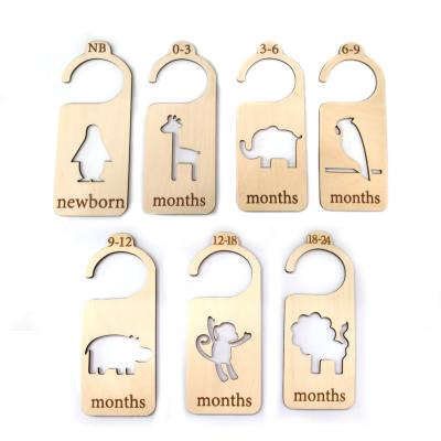 China Europe Hot Sale Customize Wooden Baby Closet Size Divider Cut Cute Animal 7 Pieces Clothes Divider With White Bag for sale