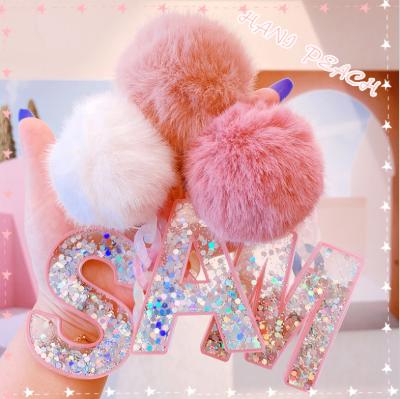 China High Quality Creamy Acrylic Big Girl Acrylic Glitter Ball Plush Color Gift Peach Key Chain Pendant Initial Letter For Wife for sale