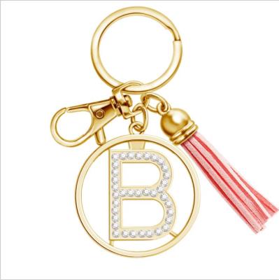 China Hot Sale Crystal Alphabet Initial Letter Pendant Handbags Gift With Tassel Letter Key Chain Key Chain For Woman for sale