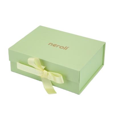 China Recycled Materials Wholesale Custom Logo Folding Box With Ribbon Wedding Gift Box Packaging for sale