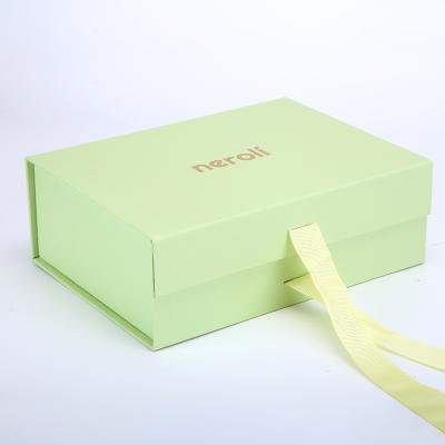 China Recycled Materials Design Large Gift Box Magnetic Lid And Ribbon Tie Rigid Paper Christmas Gifts Gift Boxes for sale