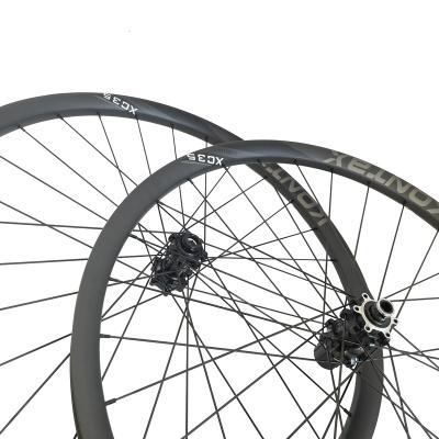 China Mountain bikes wheel set 35MM width 25MM size superteam Toray T700 Wheelset mountain bike for sale