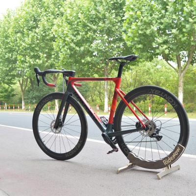 China Overseas Fully Hidden Carbon Fiber Bike SHIMANO 22 Speed ​​Integrated Tracks Road Unisex Bike for sale