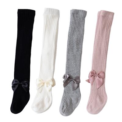 China Antibacterial Children's Gaiters Bow Spring And Princess Solid Color Girls Pantyhose Girls Autumn Socks for sale