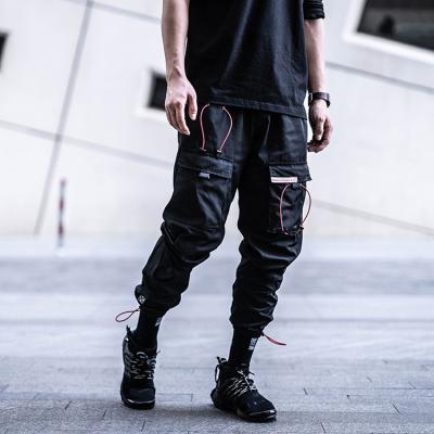 China Multi Pocket Sports Harem Loose Fit Hip Pop Pants Pants Streetwear Slim Casual Jogging Sweatpants Mens Cargo Pants Men for sale