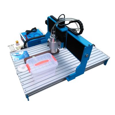 China Building Material Shops 3 Axis 1.5KW 2.2KW CNC 6090 Linear Guide Rail Wood Router Dual 4 Axis CNC Router Engraving Drilling Machine for sale