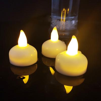 China Promotion tea water candle warm white wedding waterproof white electric floating led candle for decoration tea candle for sale