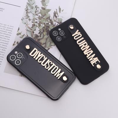 China Custom Anti-Fall Name Metal Letter Strap Cell Phone Case For iPhone 12 13 Pro Max for sale