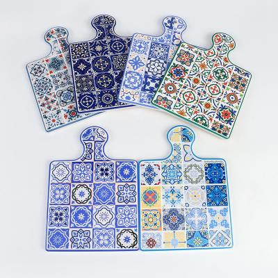 China Sustainable Square Tableware Place Mat Single Blue White Ceramic High Temperature Insulation Cork Coaster for sale