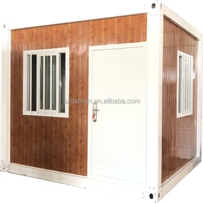 China Modern Prefab Living Container Home 10ft Portable House Tiny Warehouse For Office And Storage for sale