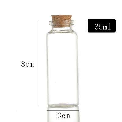 China Custom Best Buy Logo 35ml Personal Care Drift Bottle Snack Coffee Tea Candy Apothecary Glass Jars With Cork for sale