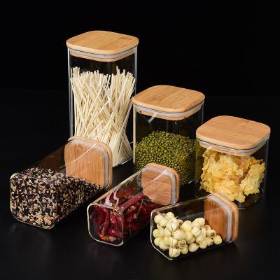 China Custom Food High Borosilicate Glass Sealed Jar With Lid Household Kitchen Supplies Bamboo Condiment Jar for sale