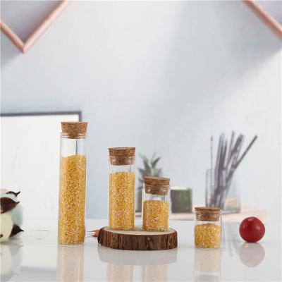 China China Hot Selling Personal Care Mini Empty Glass Wishing Bottle Storage Clear Glass Jar With Wooden Lid for sale