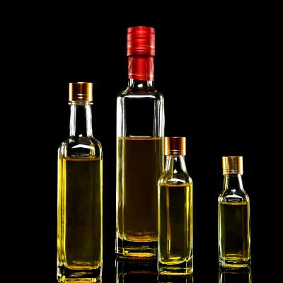 China food & Beverage packaging delicate arbutus wine bottle shape sealing strong glass bottle ice multifunctional glass bottle for sale