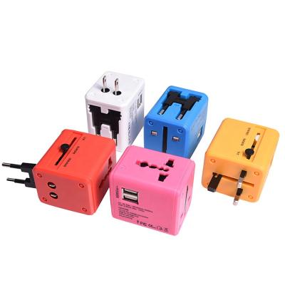 China Global International Universal Mobile Phone Travel Adapter Wall AC Power Socket Wall Cell Phone Charger with Dual USB Charging Ports for sale