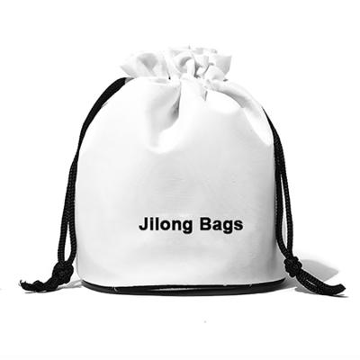 China Custom Fashion Fashion Satin Drawstring Makeup Pouch White Silk Bag With Tassels for sale