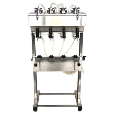 China Liquid Penumatic Filling Machine Food Perfume Filling Machine Vacuum Liquid Filler Four Head for sale