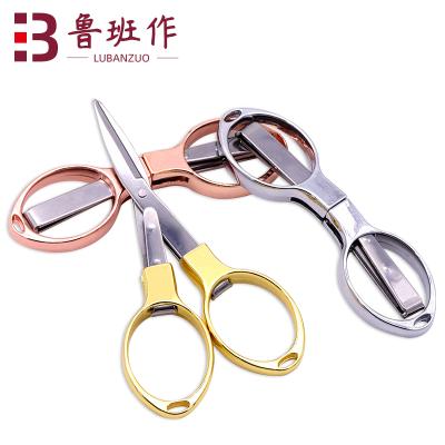 China For cutting new pink gold folding fishing scissors camping household pocket filaments small portable stainless steel multitool for sale