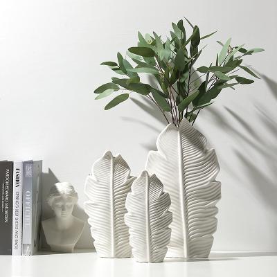 China Europe Leaf Flower Arrangement Plant Vase Living Room Table Home Flower Vase Shaped Nordic White Ceramic Vase Decoration for sale