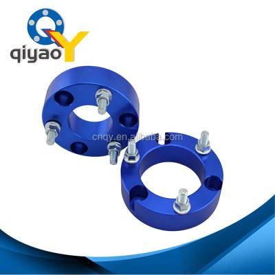 China 4wd Navara D40 Suspension Lift Kits 32mm Shock Absorber Spacer 4*100 To 5*114.3 for sale