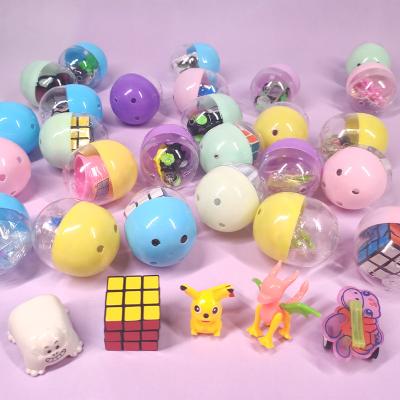 China 47mm*56mm Clear Plastic Siamese Toy Balls With Different Toy Random Mix For Vending Machine WJ3528 for sale