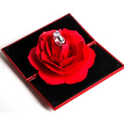 China Elegant Joyful Fashion Jewelry Boxes Rose Flower Jewelry Proposal Wedding Ring Box Hidden in Flower Surprise Box for sale