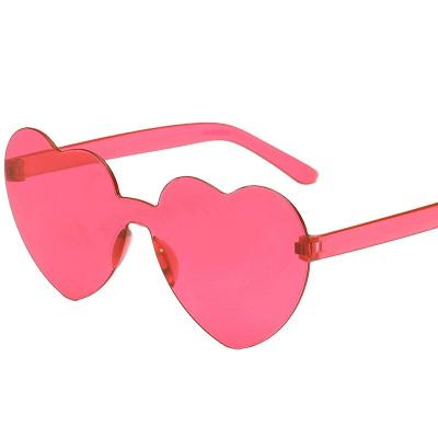 China Frameless Cute Heart Jelly Sunglasses Fashion Sunglasses Rimless Candy Color Shape Boys Girls Travel Shading Ocean Border Glasses for sale