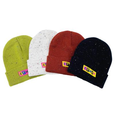 China 2020 COMMON hot sale fashion promotional colorful knots gossip acrylic winter knitted hat for sale