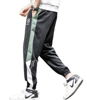 China 2020 Four Seasons breathable casual loose work pants pants fashionable running sports pants boys work pants for sale