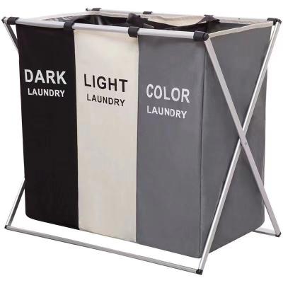 China Minimalist Three Section Folding Laundry Hamper Folding Aluminum Pipe Hamper Separate Colors Different Clothes Foldable Hamper for sale