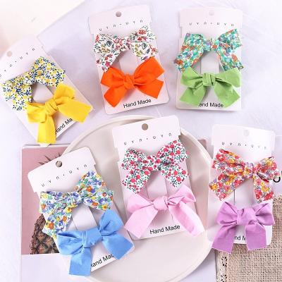 China Fashion new JK style hair accessories fabric plaid bow hair clip Korean girl ponytail hair clip for sale