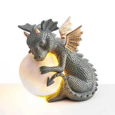 China Newest 2021 China Products Hot Creative Household Solar Garden Decorations Dinosaur Resin Statues for sale