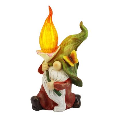 China Eclectic Garden Decorations Gnome Outdoor Lamp Resin Ornament Handwork Cartoon Statue Solar Fire Dwarf for sale