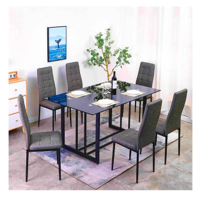 China Convertible Cheap Glass Top Restaurant Dining Room Furniture Dining Glass Table With 4 Chairs Dining Set for sale