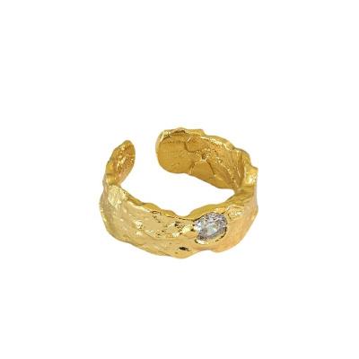 China CLASSIC Sterling silver S925 18K gold plated ins niche design personality irregular surface texture inlaid zircon open ring for women for sale