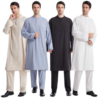 China Polyester 2023 New Middle East Men Islamic Clothing Thobe Men Muslim Spot Middle East Button Round Neck Robe Set for sale