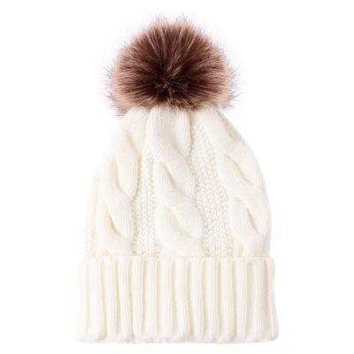 China COMMON Fashion Warm Fleece Lined Winter Women Knitted Beanie Hat With Faux Fur Knit Pom Pom Beanie for sale