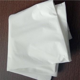 China Tender Waterproof Synthetic Stone Paper Roll For Wrapper Stationery Disposable Bags for sale