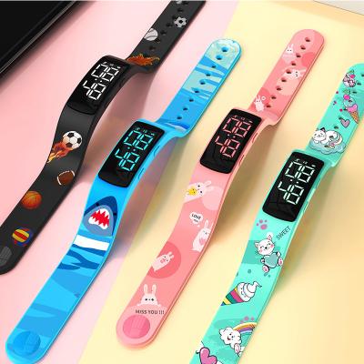 China Factory Cartoon Water Transfer Printing Silicon Strap Sport Bracelet 3D Step Pedometer LED Digital Children Watches For Men Wome for sale