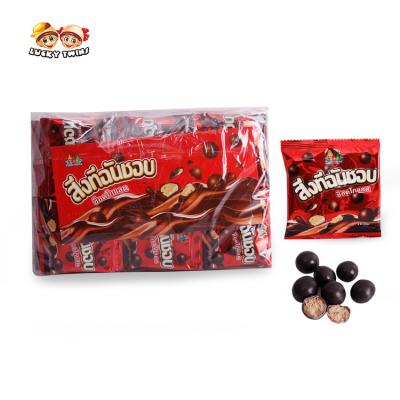 China Crispy chocolate snack chocolate with cookie filling mini center coated with custom choco balls filled biscuites chocolates for sale