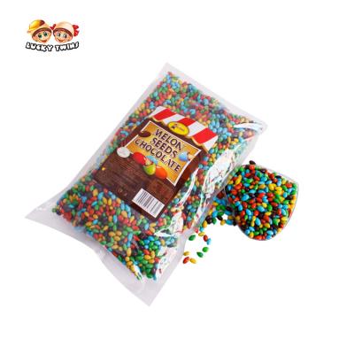 China Colorful Custom Chocolate Snacks Chocolates Candies And Small Bulk Mini Color Sunflower Seeds Chocolate for sale