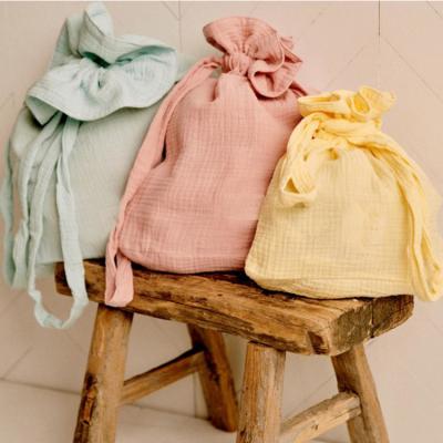 China Security Personalized Gauze Gift Pouches Plain Cotton Small Crepe Drawstring Jewelry Bag Special Texture Fabric for sale