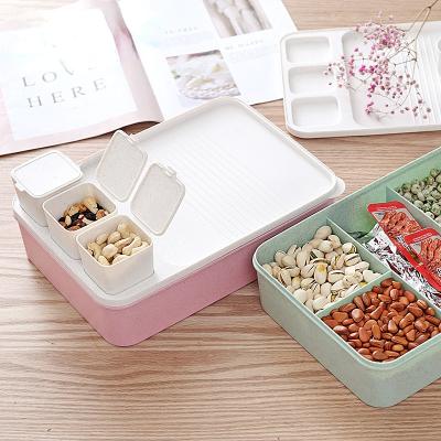 China Other Newest Household Four Grid Fruit Box Plastic Candy Box With Lid New Year Snack Storage Box for sale