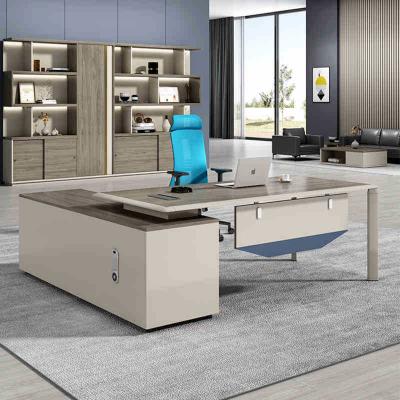 China Expandable latest unique design L shape office furniture wooden manager executive desk for sale