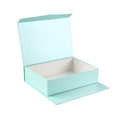 China Recyclable Custom Logo Luxury Cardboard Magnetic Folding Gift Box With Ribbon Closure for sale