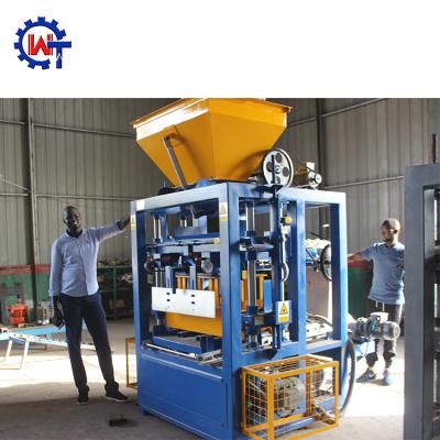 China Building Material Shops Semi Automatic Fly Ash Brick Machine QT4-24 Block Making Machine Cavity Blocks for sale