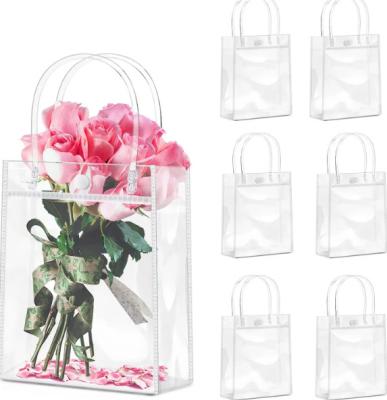 China Custom Bag Logo PVC Gift Packaging Snap Closure Plastic PVC Clear Gift Tote Bag for sale